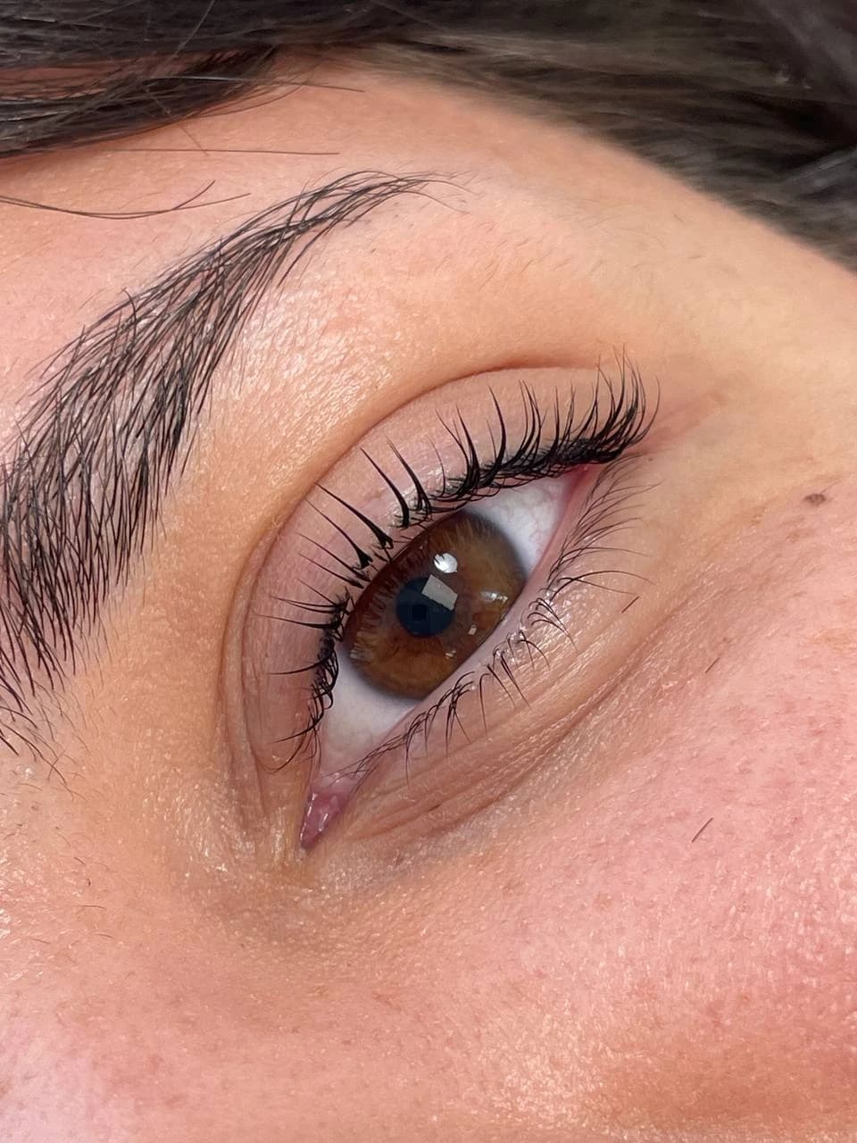 Lash lift and tint with elegant upward curl on dark separated lashes at My Beauty Space Mississauga.