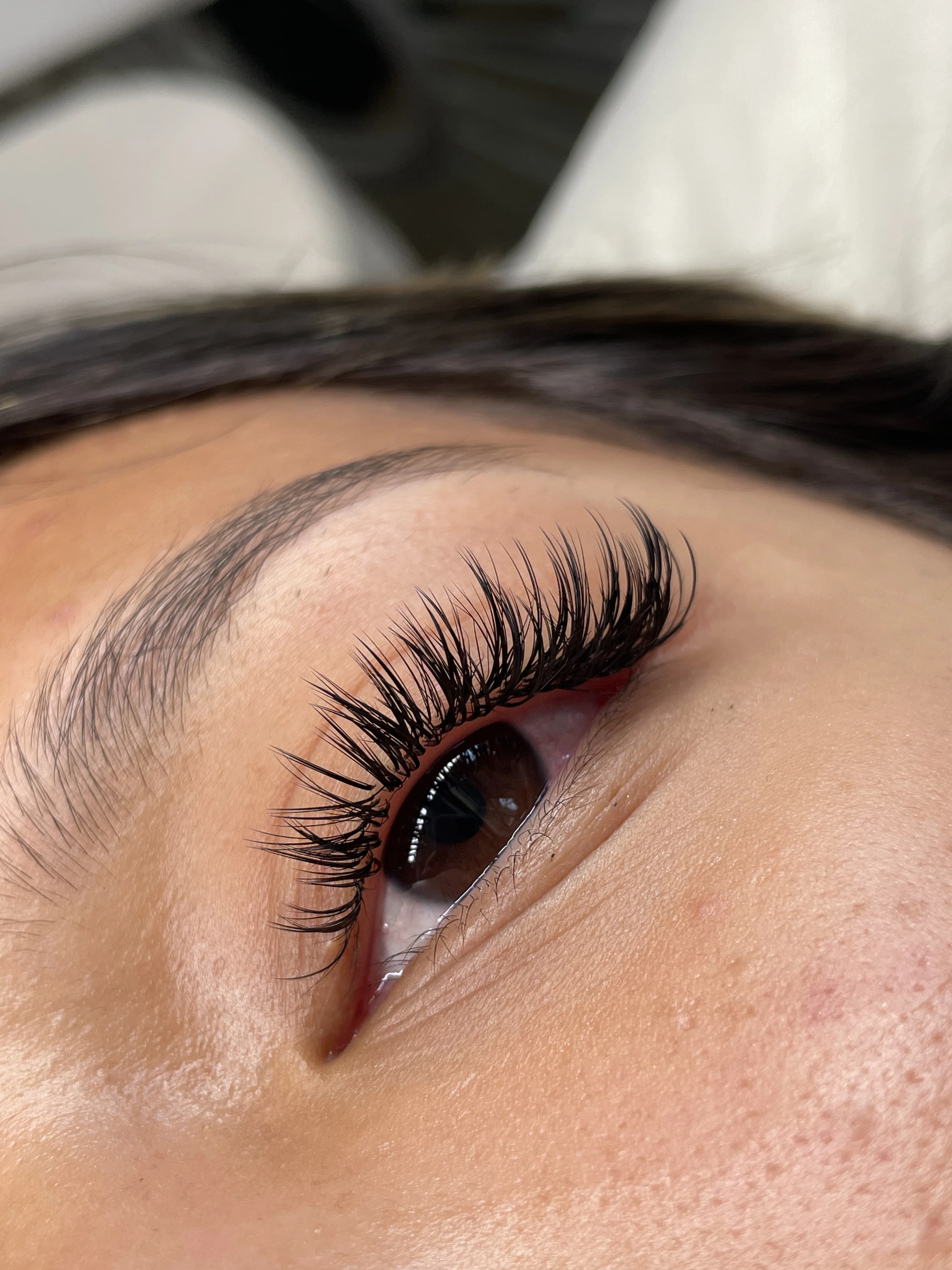 Closed-eye 3D volume lash extensions with dense jet-black fans and dramatic curl at My Beauty Space Mississauga.